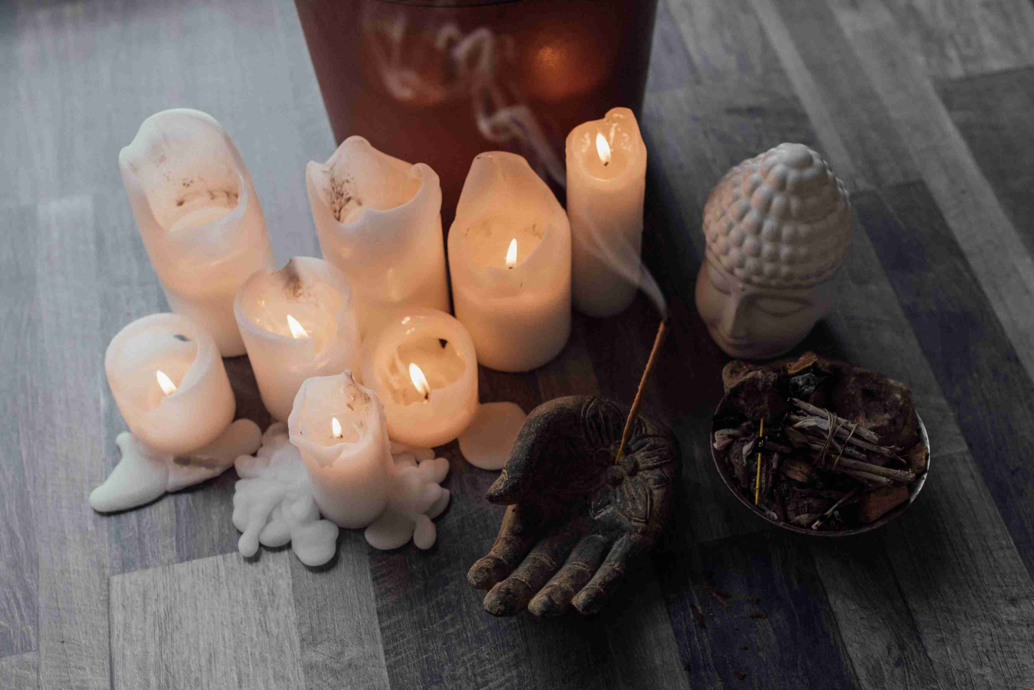 Asian massages candles and buddha with essential oils